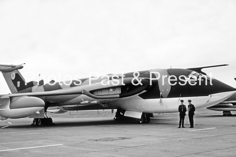 57 Military Airplane with Crew on Tarmac
